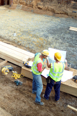 Site supervisors checking the blueprints at a recent Elite Shotcrete project